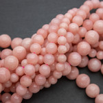 Опал розовый Перу 6 8 10 мм бусины круглые - маленькое фото 1